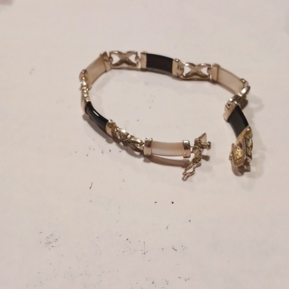 Sterling silver, onyx,mop & marcasite bracelet very beautiful